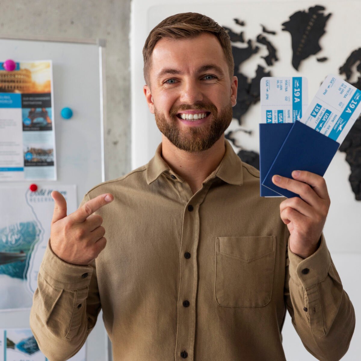 front-view-man-working-travel-agency